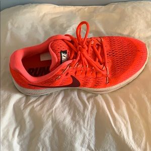 Pink NIKE running shoes